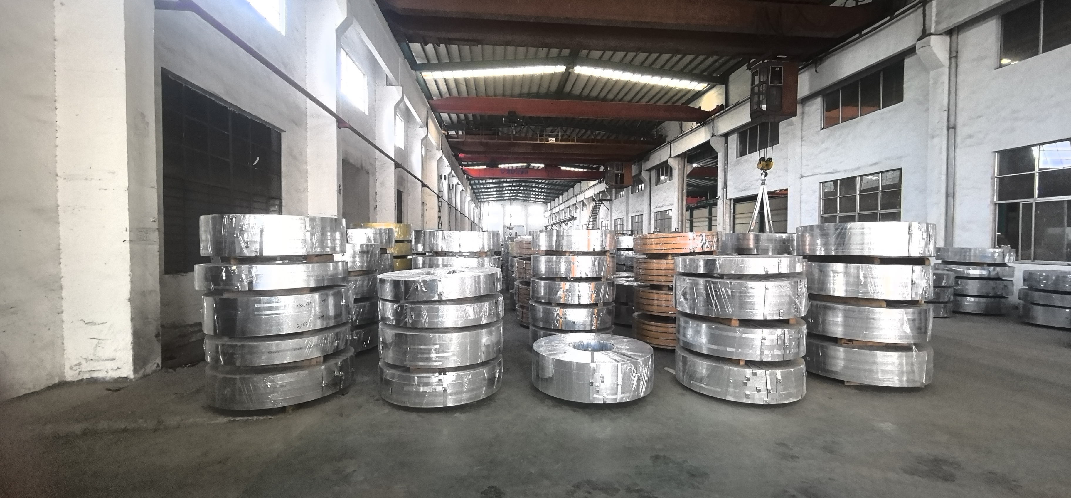 Wrapped steel strip coils stored in the Jiangyin facility hall