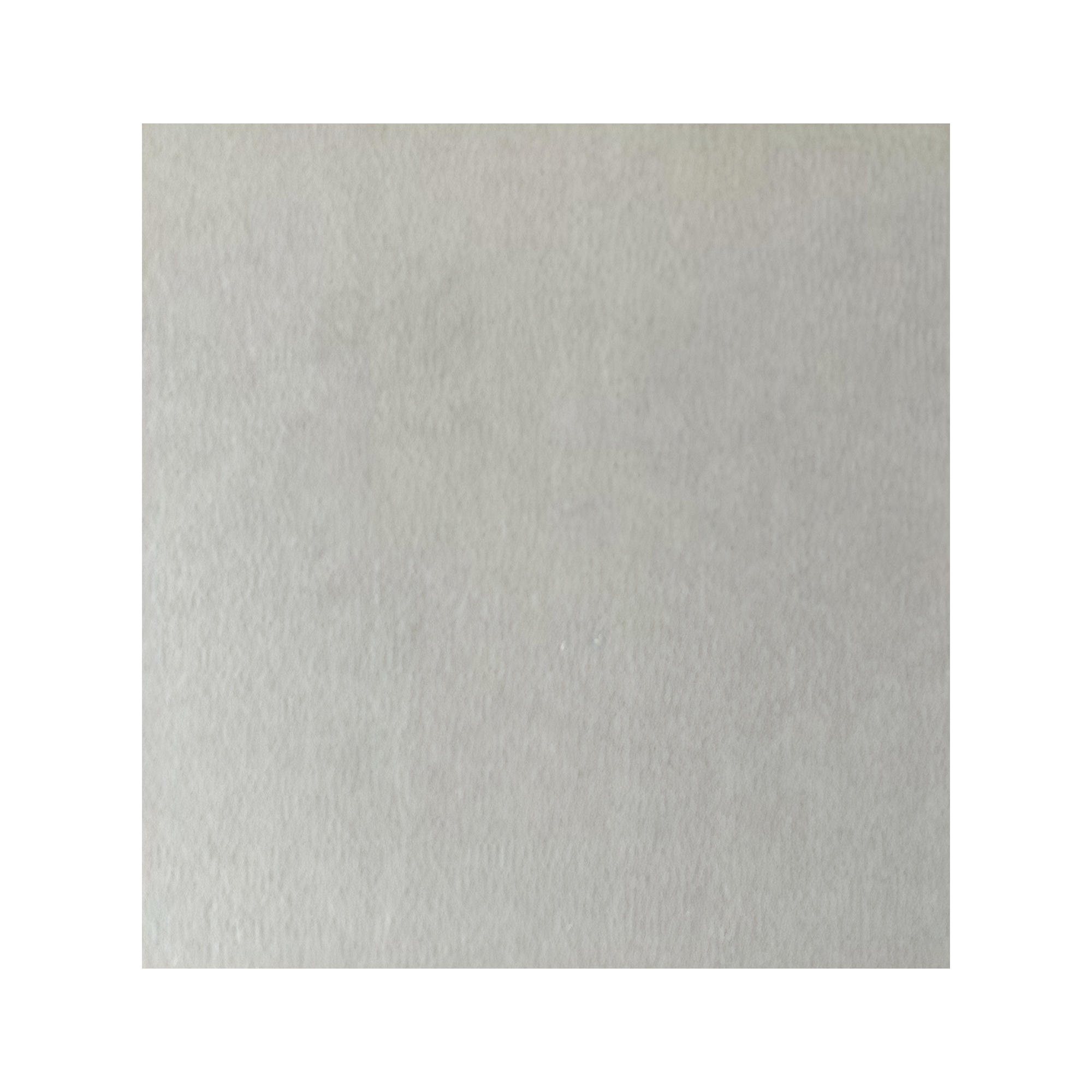 Face of a standard gypsum board sample on a white background